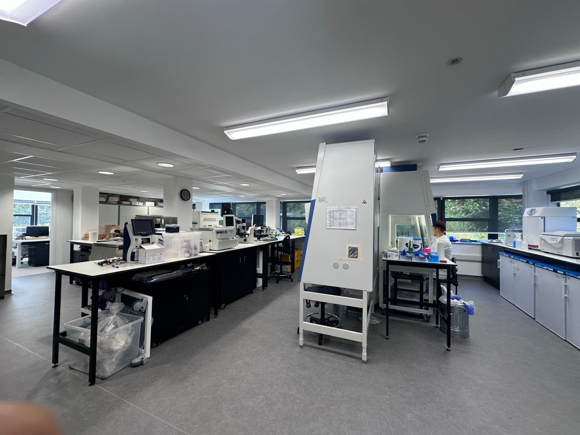 Cellcraft laboratory with bioprocess equipment and active research benches
